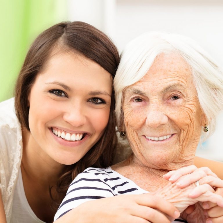 Caregiver hugging client